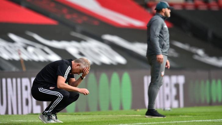 https://betting.betfair.com/football/Chris%20Wilder%20kneeling%201280.jpg